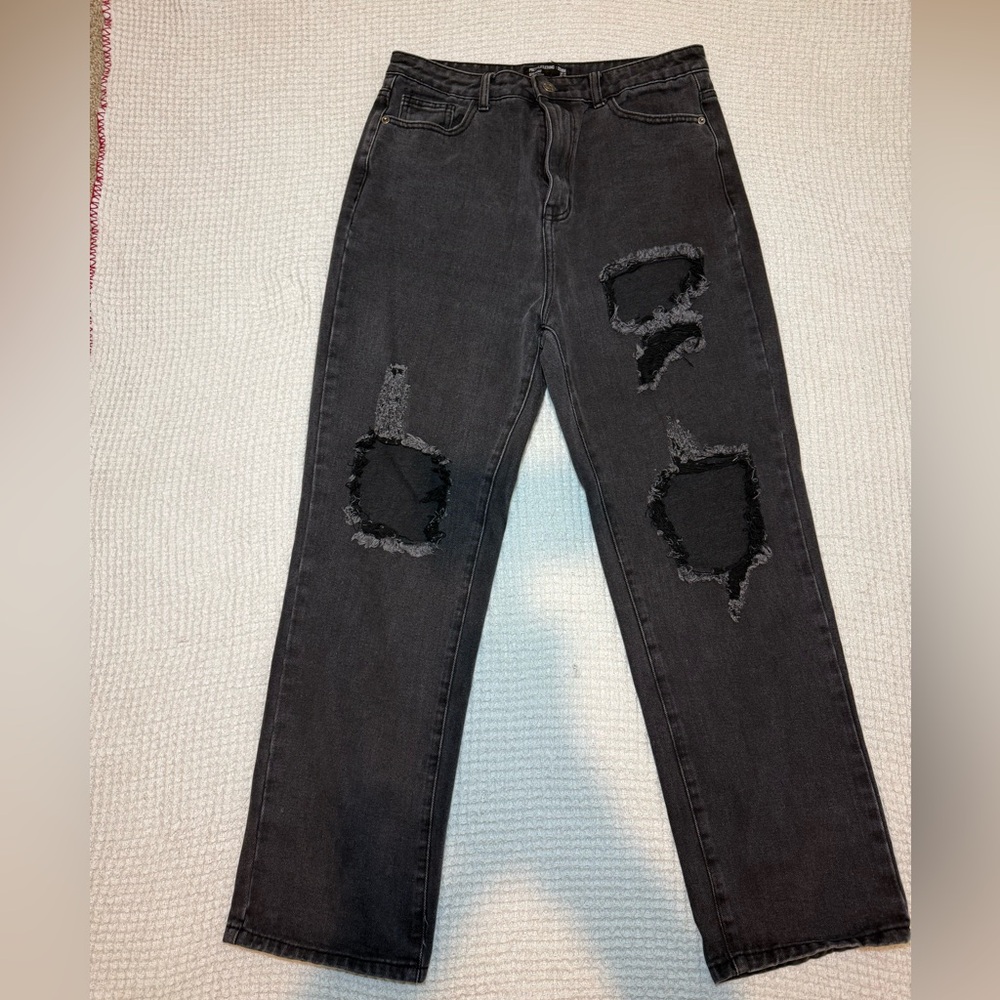 PrettyLittleThing washed black straight leg jeans with cut-out details